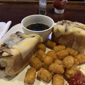 Overtime Sports Pub - French dip, roast beef sliced in house with Cajun tots - Sports Bars Near Me - Raleigh, North Carolina Overtime Sports Pub - French dip, roast beef sliced in house with Cajun tots - Sports Bars Near Me - Raleigh, North Carolina