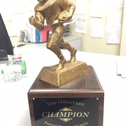 Paradise Awards - Brought in my fantasy football league's old trophy, and they cleaned it up and put on new plates.