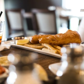 Oakroom Grill - a plate of food on a table - American Near Me - Prince George, British Columbia Oakroom Grill - a plate of food on a table - American Near Me - Prince George, British Columbia