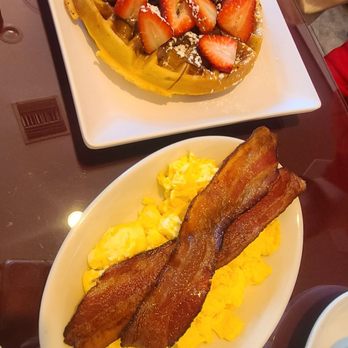 V Boulevard Cafe - Strawberry and Nutella waffle with a side of eggs and bacon - Coffee & Tea Near Me - Glendale, California
