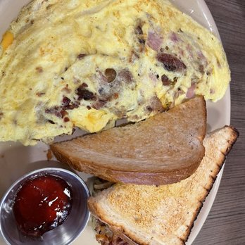 Snooze, an A.M. Eatery - Protein Trio Omelet* white toast - Breakfast & Brunch Near Me - Buford, Georgia Snooze, an A.M. Eatery - Protein Trio Omelet* white toast - Breakfast & Brunch Near Me - Buford, Georgia