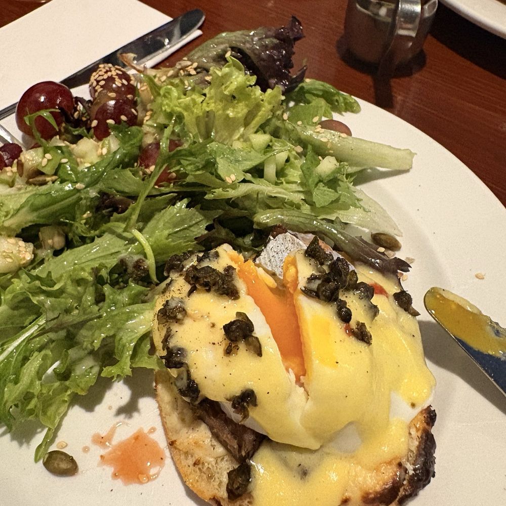 Heron Rock Bistro - Smoked salmon half order Benny with fresh salad - Breakfast & Brunch Near Me - Victoria, British Columbia