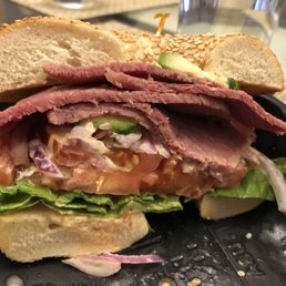 Corned beef sandwich with lettuce and tomato. Corned beef sandwich with lettuce and tomato.