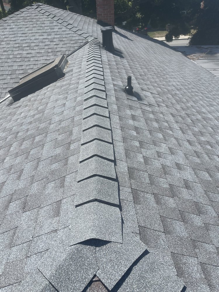 Slide of Carino Roofing’s