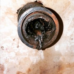 Hydro Rooters Plumbing & Drain - Example of how dirty a drain pipe can get. Our hydro-jet services completely clean the drain unlike traditional snaking which only unclogs.