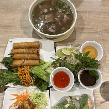 Pho Consomme - Vietnamese egg rolls , shrimp and pork spring rolls , rare brisket pho, crab and cream cheese wontons - Vietnamese Near Me - Gardena, California