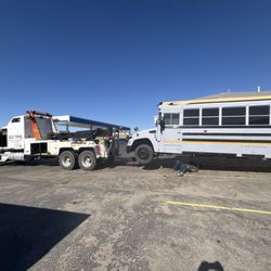 Bozz Towing & Diesel Road Service - Eli the best tow driver in the Midwest and my broke down skoolie (tow truck with 7m miles!!!!)