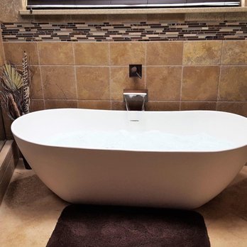 Landoll Construction - a bathtub in a bathroom - General Contractors Near Me Landoll Construction - a bathtub in a bathroom - General Contractors Near Me