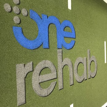 FIELD OPS Kansas - New Football Field Centerpiece at One Rehab - General Contractors Near Me FIELD OPS Kansas - New Football Field Centerpiece at One Rehab - General Contractors Near Me
