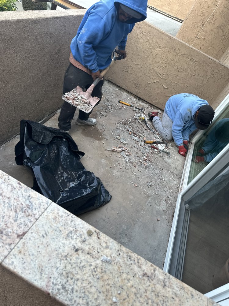 Slide of T’S Roofing