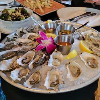 Herringbone Waikiki - Three Buck Shuck ($3 happy hour oysters - $72), Brussel sprouts, furikake fries - Seafood Near Me - Honolulu, Hawaii