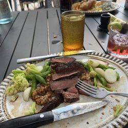 Old Piney Dell Restaurant & Bar - The weekly game special... Bison flank with fresh local vegetables