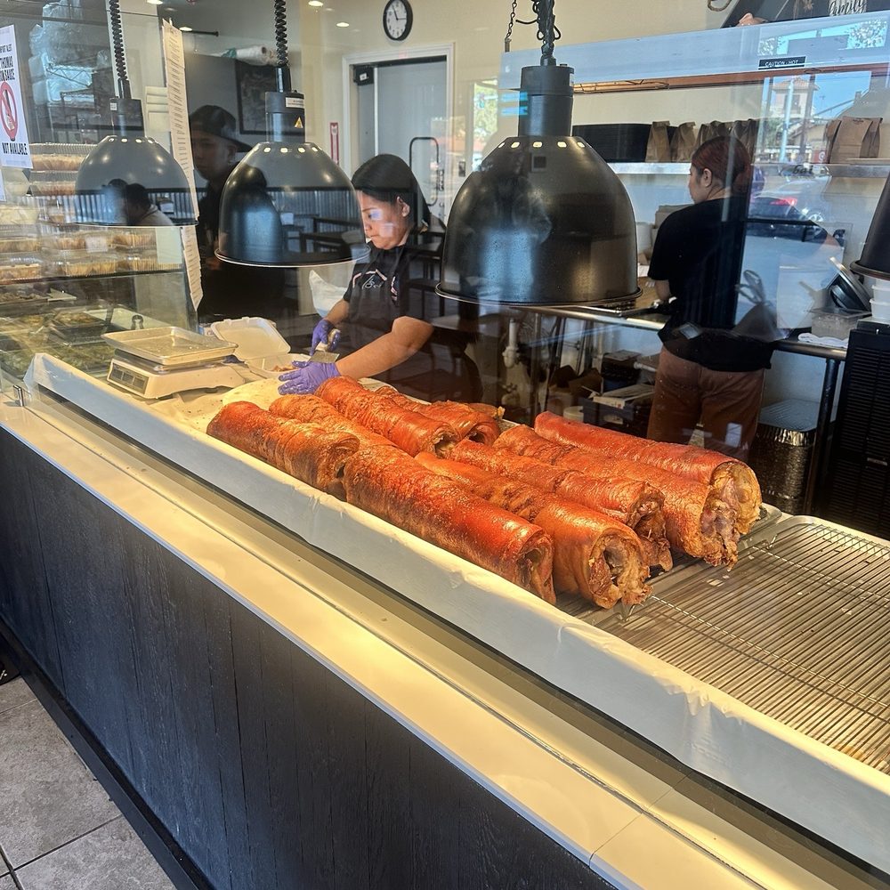 Bai Cebu Lechon - Rows of lechon ready to be prepared - Filipino Near Me - Hayward, California