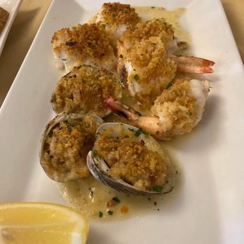 L'Italiano Trattoria - Special appetizer Misto Oreganato - baked clams, shrimp and scallops topped with breadcrumbs - Caterers Near Me - Bayside, New York L'Italiano Trattoria - Special appetizer Misto Oreganato - baked clams, shrimp and scallops topped with breadcrumbs - Caterers Near Me - Bayside, New York