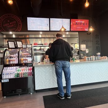 Taipei Chinese Kitchen - a man standing at the counter of a fast food restaurant - Chinese Near Me - Mechanicsburg, Pennsylvania Taipei Chinese Kitchen - a man standing at the counter of a fast food restaurant - Chinese Near Me - Mechanicsburg, Pennsylvania