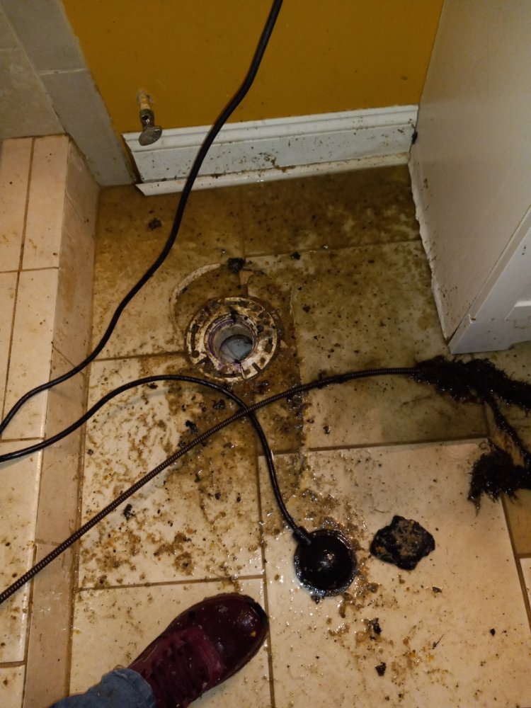 Slide of Drain Masters Drain Cleaning