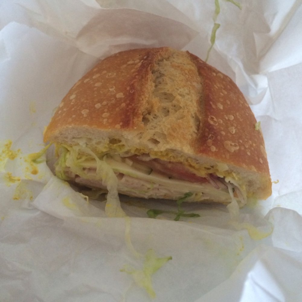 Brass Bear Delicatessen - Half of my turkey sandwich on a sourdough roll - Delis Near Me - Alamo, California Brass Bear Delicatessen - Half of my turkey sandwich on a sourdough roll - Delis Near Me - Alamo, California