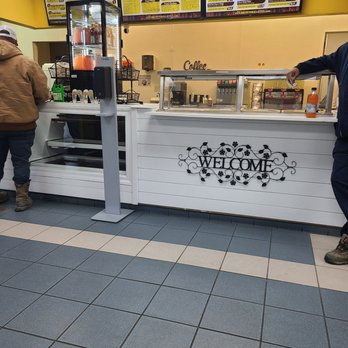 Brown Skillet UL - two people standing at a counter - Soul Food Near Me - Lafayette, Louisiana