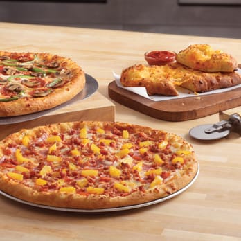 Domino's Pizza - two pizzas on a table - Pizza Near Me - Calgary, Alberta Domino's Pizza - two pizzas on a table - Pizza Near Me - Calgary, Alberta