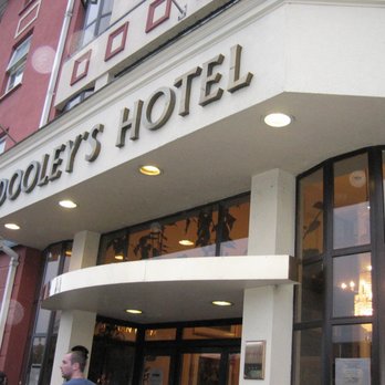 Dooley's Hotel - front facade before it was painted a dark royal blue. - Hotels Near Me - Waterford, WD