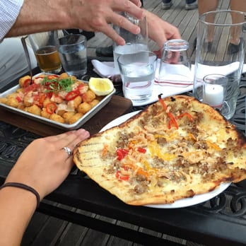 Refinery Rooftop - Lobster tater tots and sausage flatbread were both amaze! - Lounges Near Me - New York, New York Refinery Rooftop - Lobster tater tots and sausage flatbread were both amaze! - Lounges Near Me - New York, New York