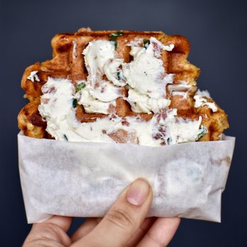 Tbsp Liège Waffles - a hand holding a waffle - Waffles Near Me - Minneapolis, Minnesota Tbsp Liège Waffles - a hand holding a waffle - Waffles Near Me - Minneapolis, Minnesota