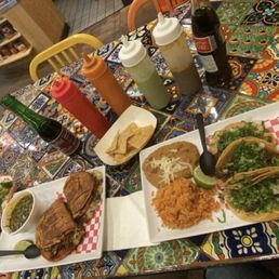 Torta Birria Y Consome, Taco Dinner, pastor taco, Coca Cola, sangria. Torta Birria Y Consome, Taco Dinner, pastor taco, Coca Cola, sangria.