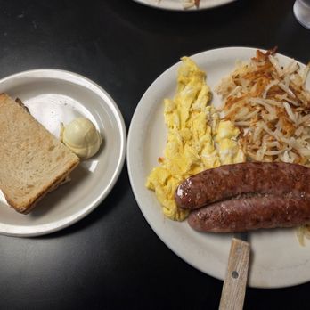The Red Hut Cafe - Spicy Italian sausage breakfast with hash browns scrambled eggs and sourdough toast - American Near Me - Carson City, Nevada