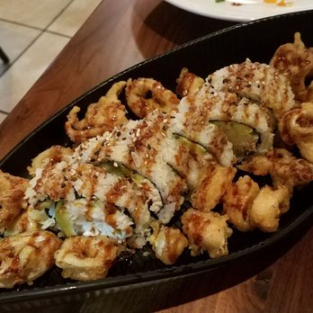Sapporo Sushi - Calimari Tempura Roll which comes with extra calimari. Tender and delicious! - Japanese Near Me - Long Beach, California