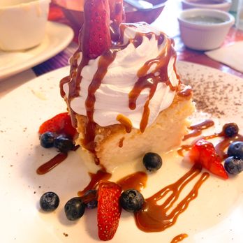 Rita's Cantina Mexican Kitchen - a desert with whipped cream, strawberries, and blueberries - Mexican Near Me - Pinehurst, Texas Rita's Cantina Mexican Kitchen - a desert with whipped cream, strawberries, and blueberries - Mexican Near Me - Pinehurst, Texas