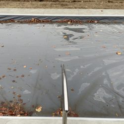 Pools of Fun - handrail is angled left and not square to pool