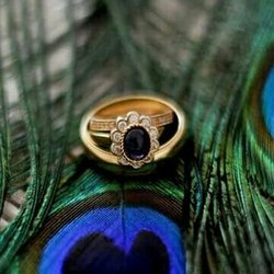 Lolli's Jewelry Etc - Custom made lady's wedding set in 14K yellow and white gold with a cabochon blue sapphire and round brilliant diamonds.