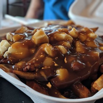 La Poutinerie Albert - Large (family size) regular poutine. We split between 3 people in July 2019 - Burgers Near Me - Gatineau, Quebec La Poutinerie Albert - Large (family size) regular poutine. We split between 3 people in July 2019 - Burgers Near Me - Gatineau, Quebec