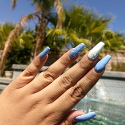 NailsByChoyce - Blue gel, sharpie marble nail, and silver foil