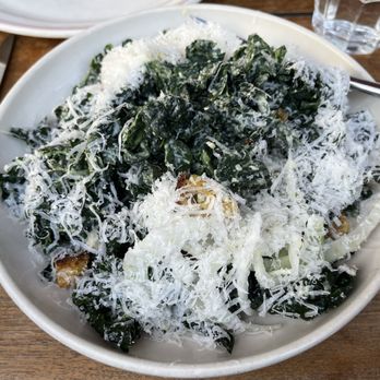 a Mano - Tuscan Kale Salad with some Parmesan moved aside to show that it's not only a Parmesan mountain - Italian Near Me - San Francisco, California