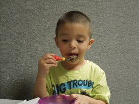 Feeding Therapy - What are feeding and swallowing disorders?
Feeding disorders include problems gathering food and getting ready to suck, chew, or swallow it. A child who cannot chew their food sufficiently, swallow easily, or who coughs, chokes or gags when eating or drinking may have a swallowing disorder. A picky feeder may not eat foods of certain textures, temperatures or colors or foods of different brands/shapes. In its most severe form, a child may have to eat through a G-Tube or have failure to thrive.
What are some signs or symptoms of feeding and swallowing disorders in children?
Children with feeding and swallowing problems have a wide variety of symptoms. Not all signs and symptoms are present in every child.
The following are signs and symptoms of feeding and swallowing problems in very young children:
arching or stiffening of the body during feeding
irritability or lack of alertness during feeding
refusing food or liquid
failure to accept different textures of food (e.g., only pureed foods or crunchy cereals)
long feeding times (e.g., more than 30 minutes)
difficulty chewing
difficulty breast feeding
coughing or gagging during meals
excessive drooling or food/liquid coming out of the mouth or nose
difficulty coordinating breathing with eating and drinking
increased stuffiness during meals
gurgly, hoarse, or breathy voice quality
frequent spitting up or vomiting
recurring pneumonia or respiratory infections
less than normal weight gain or growth
As a result, children may be at risk for:
dehydration or poor nutrition
aspiration (food or liquid entering the airway) or penetration
pneumonia or repeated upper respiratory infections that can lead to chronic lung disease
embarrassment or isolation in social situations involving eating
What treatments are available for children with feeding and swallowing disorders?
Treatment varies greatly depending on the cause and symptoms of the swallowing problem.
Based on the results of the feeding and swallowing evaluation, the OT or SLP may recommend any of the following:
medical intervention (e.g., medicine for reflux)
direct feeding therapy designed to meet individual needs
nutritional changes (e.g., different foods, adding calories to food)
increasing acceptance of new foods or textures
food temperature and texture changes
postural or positioning changes (e.g., different seating)
behavior management techniques
referral to other professionals, such as a psychologist or dentist
If feeding therapy with an OT or SLP is recommended, the focus on intervention may include the following:
making the muscles of the mouth stronger
increasing tongue movement
improving chewing
increasing acceptance of different foods and liquids
improving sucking and/or drinking ability
coordinating the suck-swallow-breath pattern (for infants)
altering food textures and liquid thickness to ensure safe swallowing
using utensils and drinking from cups
bottle/breast feeding
G-Tube weaning; Feeding Therapy - What are feeding and swallowing disorders?
Feeding disorders include problems gathering food and getting ready to suck, chew, or swallow it. A child who cannot chew their food sufficiently, swallow easily, or who coughs, chokes or gags when eating or drinking may have a swallowing disorder. A picky feeder may not eat foods of certain textures, temperatures or colors or foods of different brands/shapes. In its most severe form, a child may have to eat through a G-Tube or have failure to thrive.
What are some signs or symptoms of feeding and swallowing disorders in children?
Children with feeding and swallowing problems have a wide variety of symptoms. Not all signs and symptoms are present in every child.
The following are signs and symptoms of feeding and swallowing problems in very young children:
arching or stiffening of the body during feeding
irritability or lack of alertness during feeding
refusing food or liquid
failure to accept different textures of food (e.g., only pureed foods or crunchy cereals)
long feeding times (e.g., more than 30 minutes)
difficulty chewing
difficulty breast feeding
coughing or gagging during meals
excessive drooling or food/liquid coming out of the mouth or nose
difficulty coordinating breathing with eating and drinking
increased stuffiness during meals
gurgly, hoarse, or breathy voice quality
frequent spitting up or vomiting
recurring pneumonia or respiratory infections
less than normal weight gain or growth
As a result, children may be at risk for:
dehydration or poor nutrition
aspiration (food or liquid entering the airway) or penetration
pneumonia or repeated upper respiratory infections that can lead to chronic lung disease
embarrassment or isolation in social situations involving eating
What treatments are available for children with feeding and swallowing disorders?
Treatment varies greatly depending on the cause and symptoms of the swallowing problem.
Based on the results of the feeding and swallowing evaluation, the OT or SLP may recommend any of the following:
medical intervention (e.g., medicine for reflux)
direct feeding therapy designed to meet individual needs
nutritional changes (e.g., different foods, adding calories to food)
increasing acceptance of new foods or textures
food temperature and texture changes
postural or positioning changes (e.g., different seating)
behavior management techniques
referral to other professionals, such as a psychologist or dentist
If feeding therapy with an OT or SLP is recommended, the focus on intervention may include the following:
making the muscles of the mouth stronger
increasing tongue movement
improving chewing
increasing acceptance of different foods and liquids
improving sucking and/or drinking ability
coordinating the suck-swallow-breath pattern (for infants)
altering food textures and liquid thickness to ensure safe swallowing
using utensils and drinking from cups
bottle/breast feeding
G-Tube weaning;