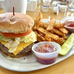 Golden Rye Grille - Cheeseburger with coated steak fries and pickle spear
