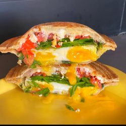 Zookz Sandwiches - Winner "Best Breakfast Sandwich in Arizona"  No. 33  Two poached eggs, parmesan, feta, fresh spinach, tomatoes and fresh basil