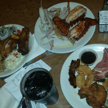 Serrano Buffet - Our plates. Good crab legs and battered shrimp. . . Everything else was meh. . . - Buffets Near Me - Highland, California
