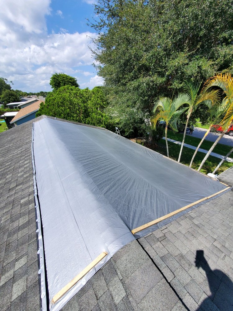 Slide of RoofTop Tarping