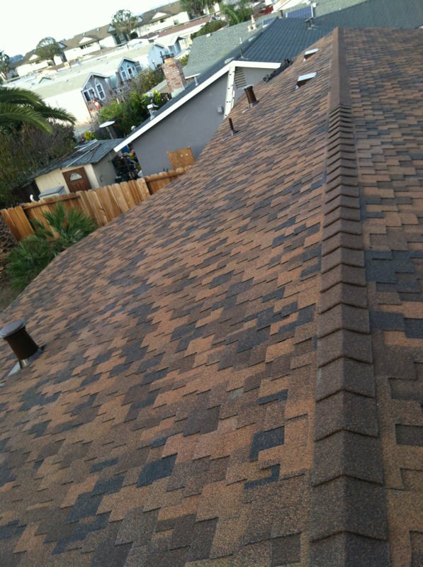 Slide of T J Roofing