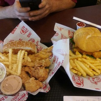 Raising Cane's Chicken Fingers - Box combo $7.71 and Sandwich combo $6.69 - Fast Food Near Me - Denton, Texas Raising Cane's Chicken Fingers - Box combo $7.71 and Sandwich combo $6.69 - Fast Food Near Me - Denton, Texas