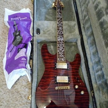 Chautauqua Music - Schecter diamond series gold inlay with pearl fret! Had to get it! $400 with hard case $14 stand what a steal - Musical Instruments & Teachers Near Me - Jamestown, New York