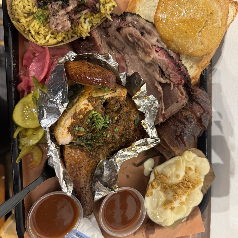 I got the rice , chicken , brisket , Mac and cheese , ancho bbq and corn bread. I got the rice , chicken , brisket , Mac and cheese , ancho bbq and corn bread.