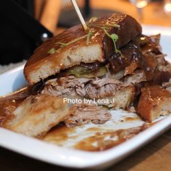 Smakołyki - Maczanka po krakowsku (Cracow's style "Maczanka") (52 zł) - bread, slow cooked pork, cucumber, onion jam, dark sauce. It's huge.