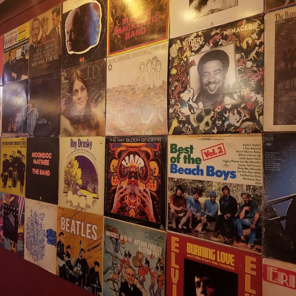 Lucy's - Wall Decor Of Album Covers From The 50s, 60s & 70s - American Near Me - Chicago, Illinois Lucy's - Wall Decor Of Album Covers From The 50s, 60s & 70s - American Near Me - Chicago, Illinois
