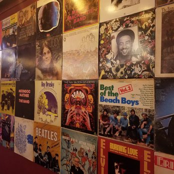 Lucy's - Wall Decor Of Album Covers From The 50s, 60s & 70s - American Near Me - Chicago, Illinois