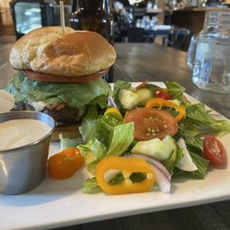 Firehouse Burger with house salad Firehouse Burger with house salad