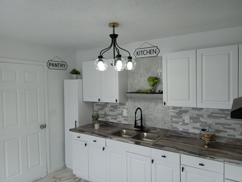 Slide of JT Reface Plumbing and Construction