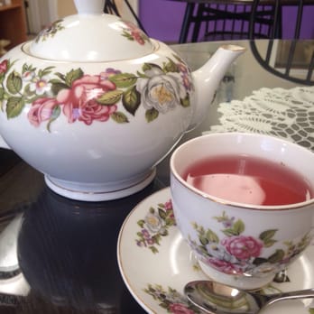 Nanny's Cupboard & Teahouse - Huckleberry tea in a lovely vintage teapot. - Tea Rooms Near Me - Cranbrook, British Columbia
